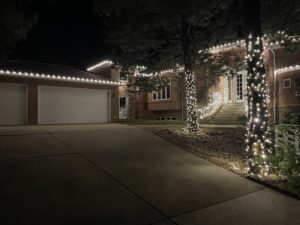 Precision-fit C9 LED holiday lights on a Denver home roofline.